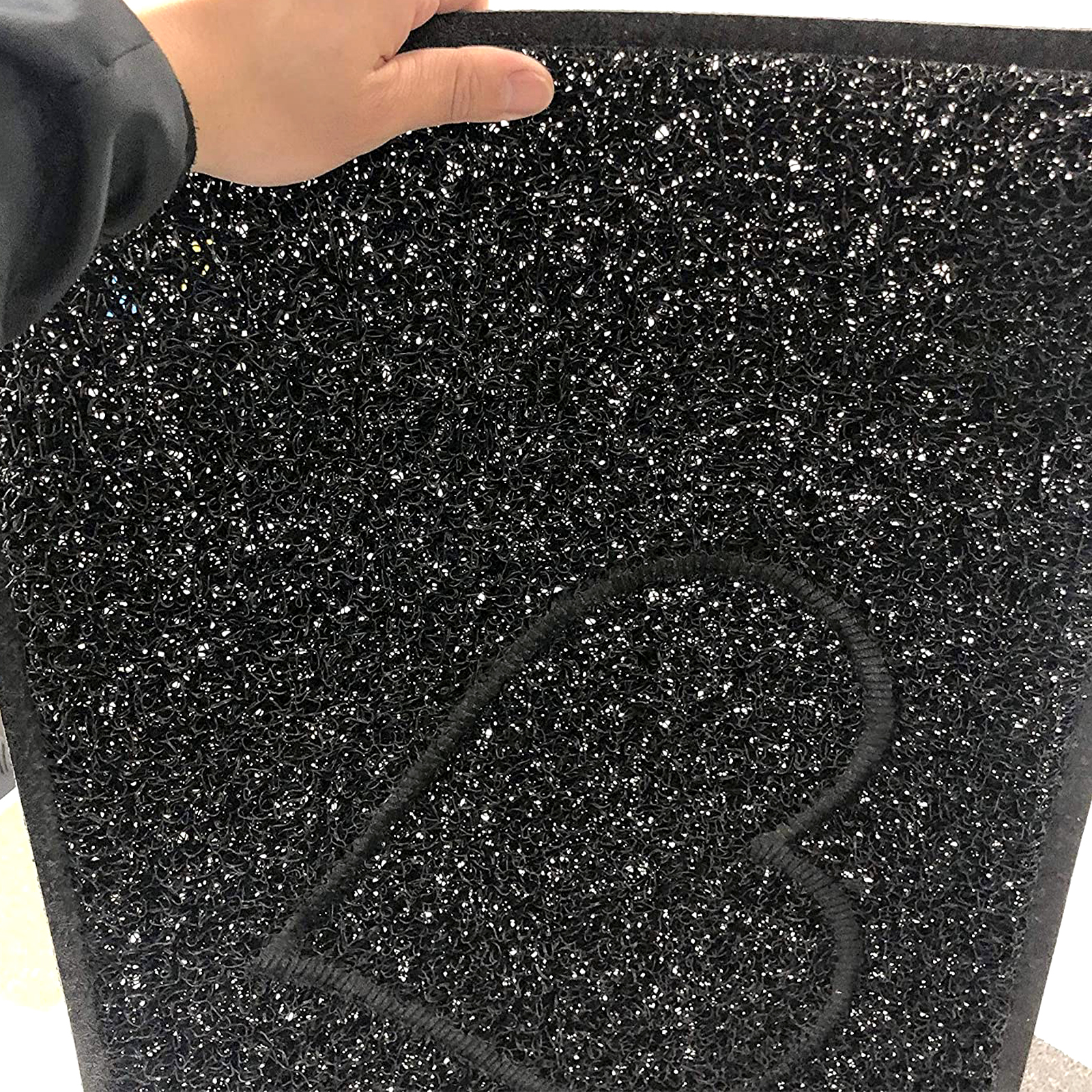 heart large embossed doormat in black with open back